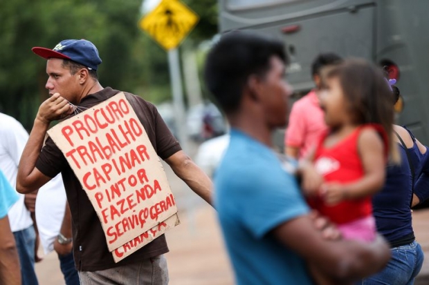 Imigrantes venezuelanos são abrigados em instalações provisórias em Boa Vista.