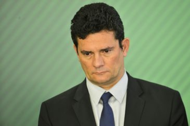  O ministro da Justiça e Segurança Pública, Sérgio Moro, durante cerimônia de assinatura do decreto que flexibiliza a posse de armas no país. 