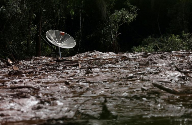A parabolic antenna is seen over mud after a dam owned by Brazilian miner Vale SA that burst, in Brumadinho, Brazil January 26, 2019. REUTERS/Adriano Machado