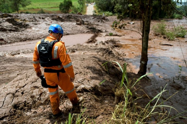 A rescue worker is seen after a dam, owned by Brazilian miner Vale SA, burst in Brumadinho, Brazil January 26, 2019. REUTERS/Washington Alves