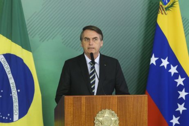 O presidente Jair Bolsonaro durante encontro com o autoproclamado presidente interino da Venezuela, Juan Guaidó, no Palácio do Planalto.