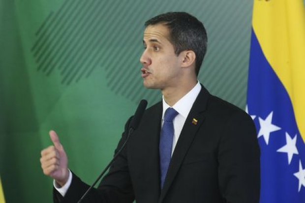 O autoproclamado presidente interino da Venezuela, Juan Guaidó, fala durante encontro com o presidente Jair Bolsonaro, no Palácio do Planalto.