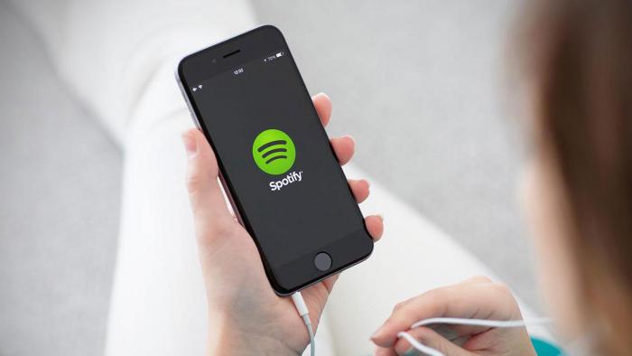 Quantas vezes você deve ouvir uma música no Spotify para o músico pagar boletos? - 1