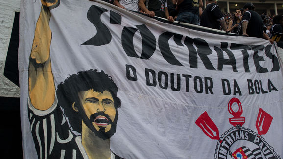 Supporters of Corinthians stand next to