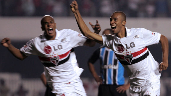 Miranda (R), of Sao Paulo FC, celebrates...