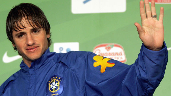 Brazilian footballer Edmilson waves as h