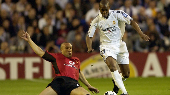 Flavio Conceicao of Real Madrid and Mikael Silvestre of Manchester United