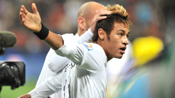 Santos striker Neymar (C) celebrates his