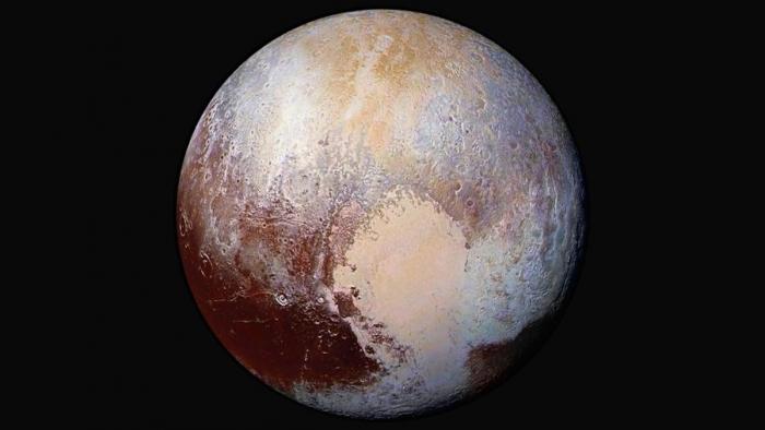 Coração gelado de Plutão impulsiona circulação atmosférica do planeta-anão - 1