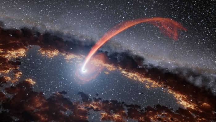 NASA destaca imagem do rastro luminoso de estrela que passou por um buraco negro - 1