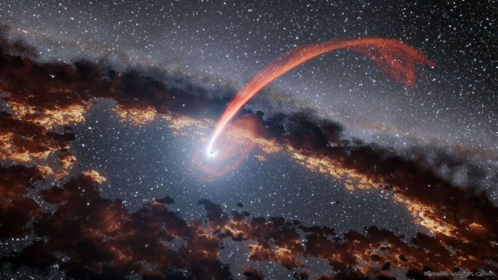 NASA destaca imagem do rastro luminoso de estrela que passou por um buraco negro - 2