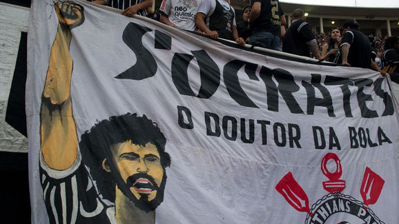 Supporters of Corinthians stand next to