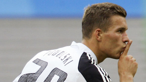 German forward Lukas Podolski jubilates