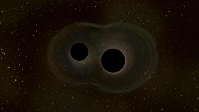 Ondas gravitacionais podem revelar formato de buracos negros após colidirem - 1