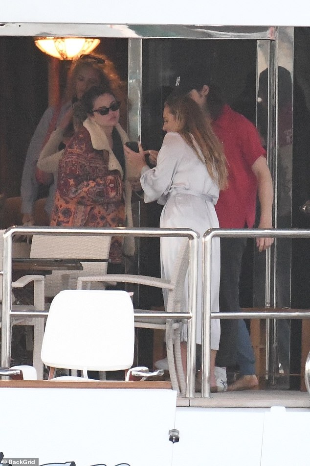 Looks like a work day as well: The siren could have been doing a photo shoot on the yacht